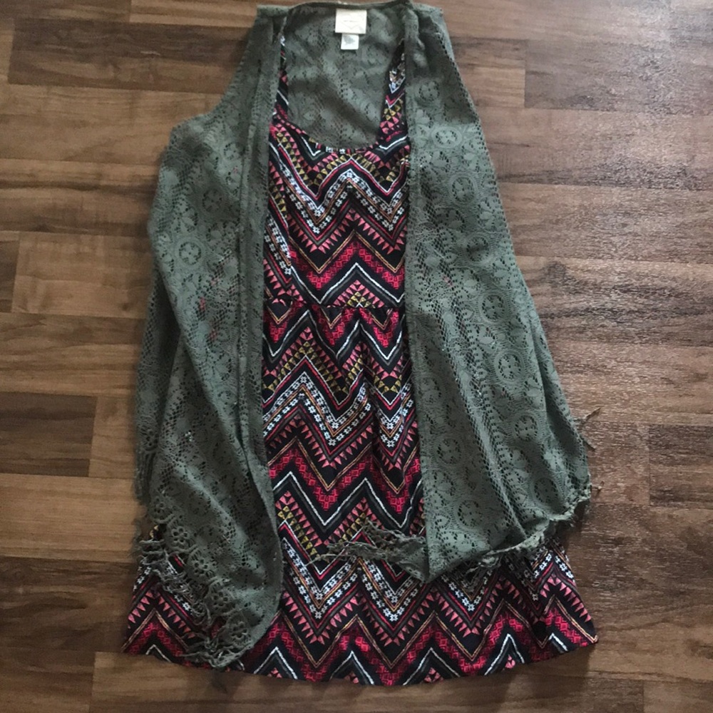 Women’s dress and green shaw.